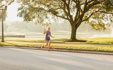 a woman running on a road