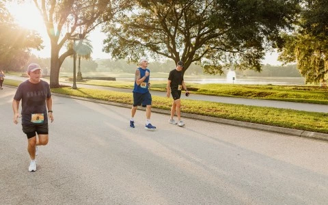 a group of men running on a road