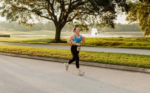 a woman running on a road