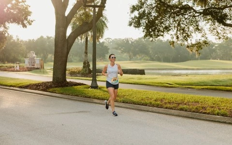a woman running on a road