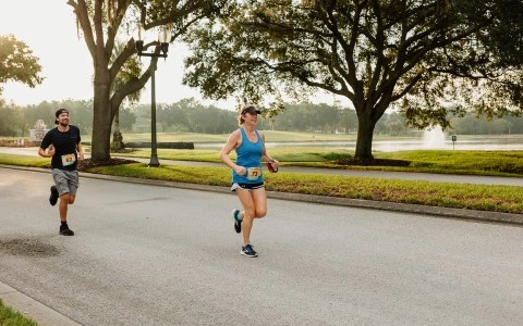 a woman running on a road