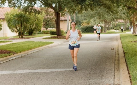 a woman running on a road