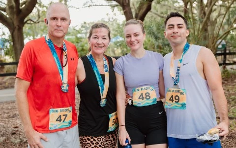 a group of people wearing medals