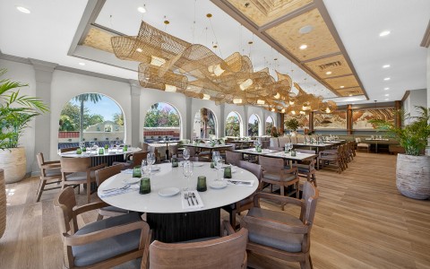 a large room with tables and chairs