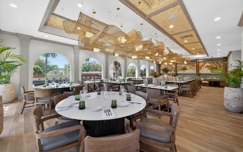 a large room with tables and chairs