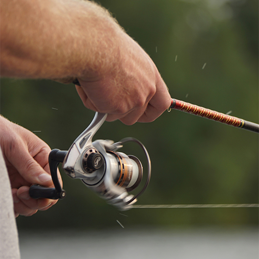 a person holding a fishing pole