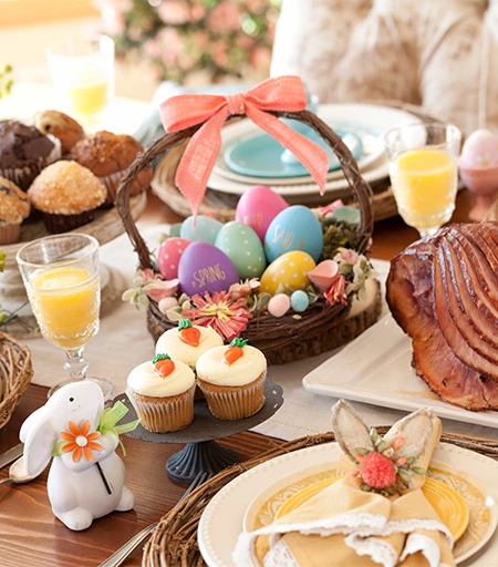 a table with food and a basket of eggs