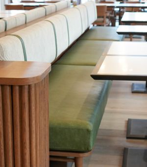 long green and white booth seating