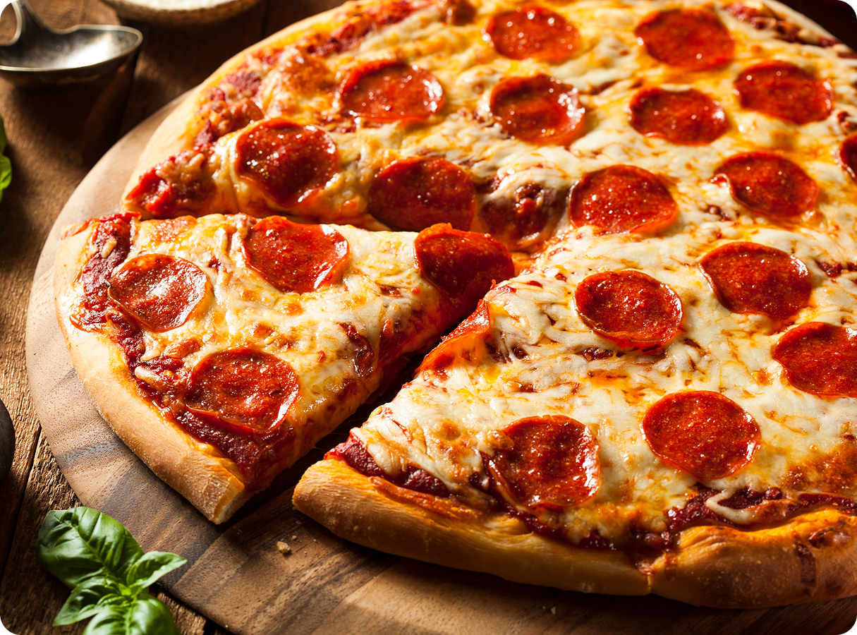 a pepperoni pizza on a wooden board