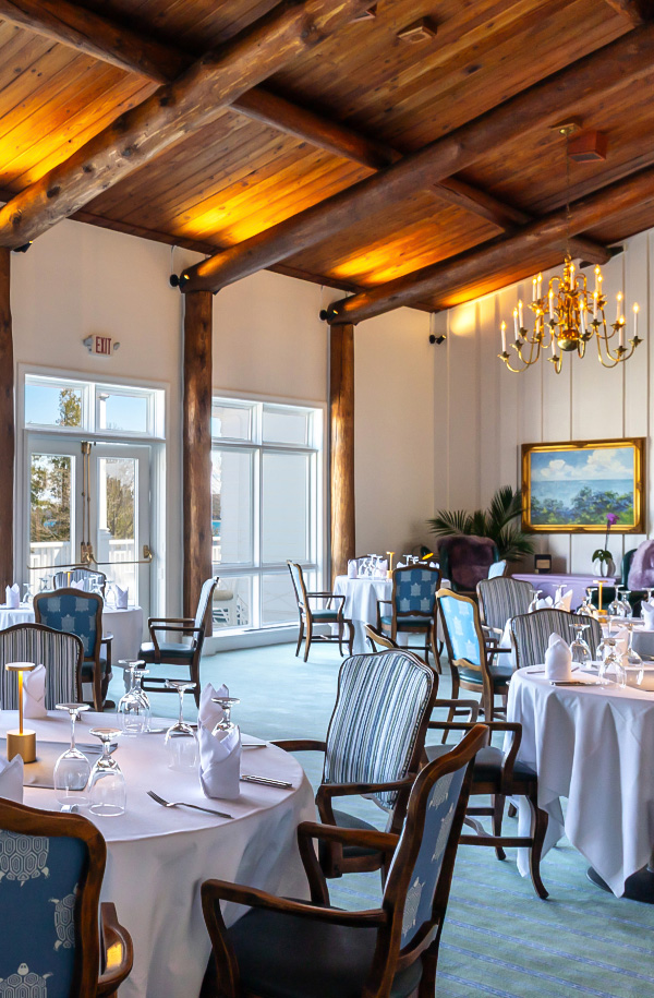 a room with tables and chairs