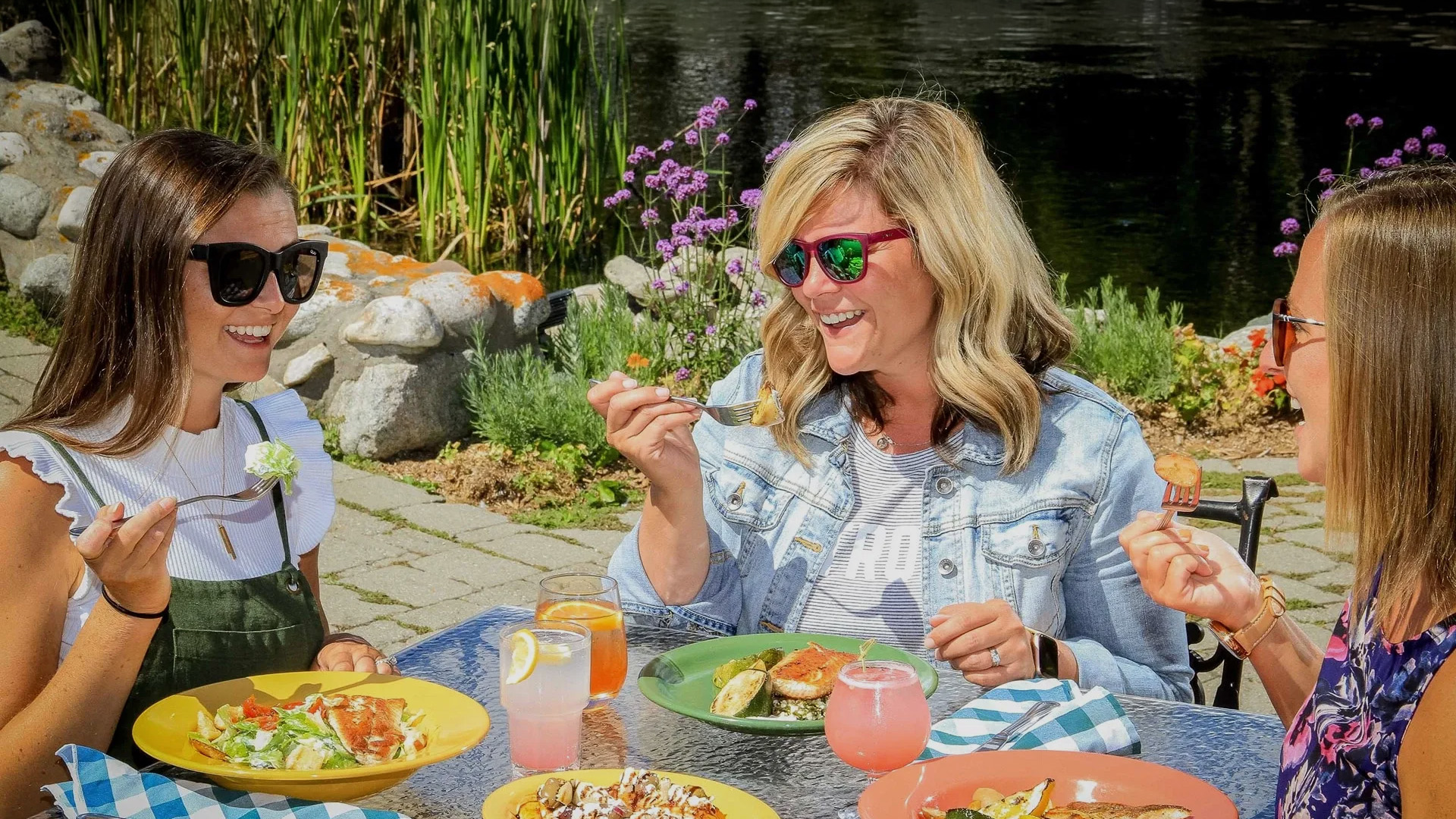 a woman eating at a table