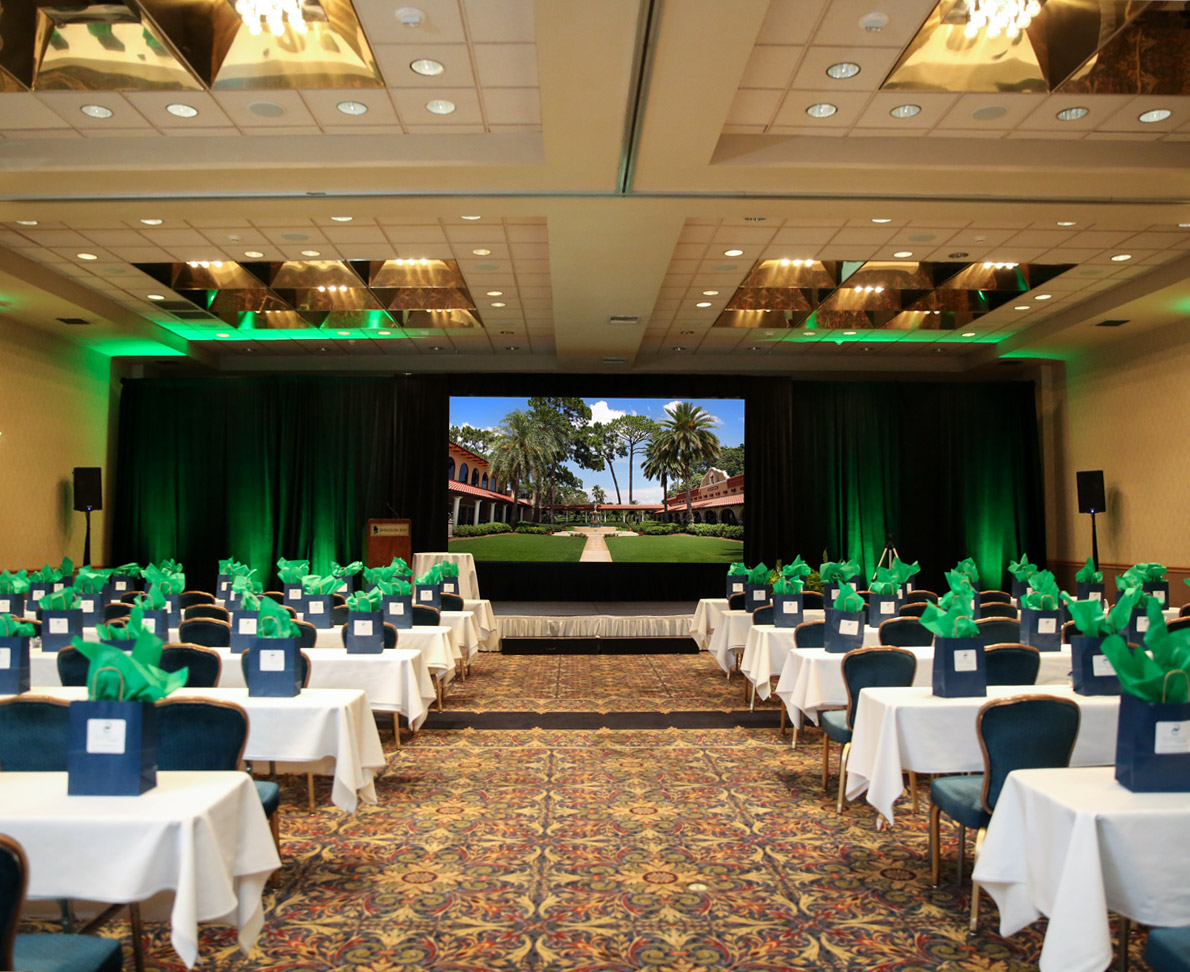 a room with tables and chairs