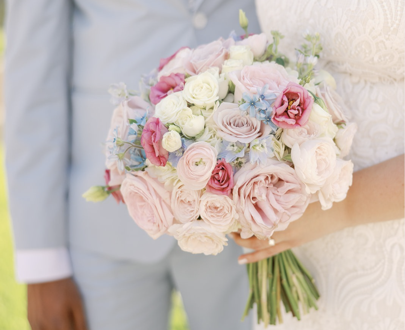 a person holding a bouquet of flowers
