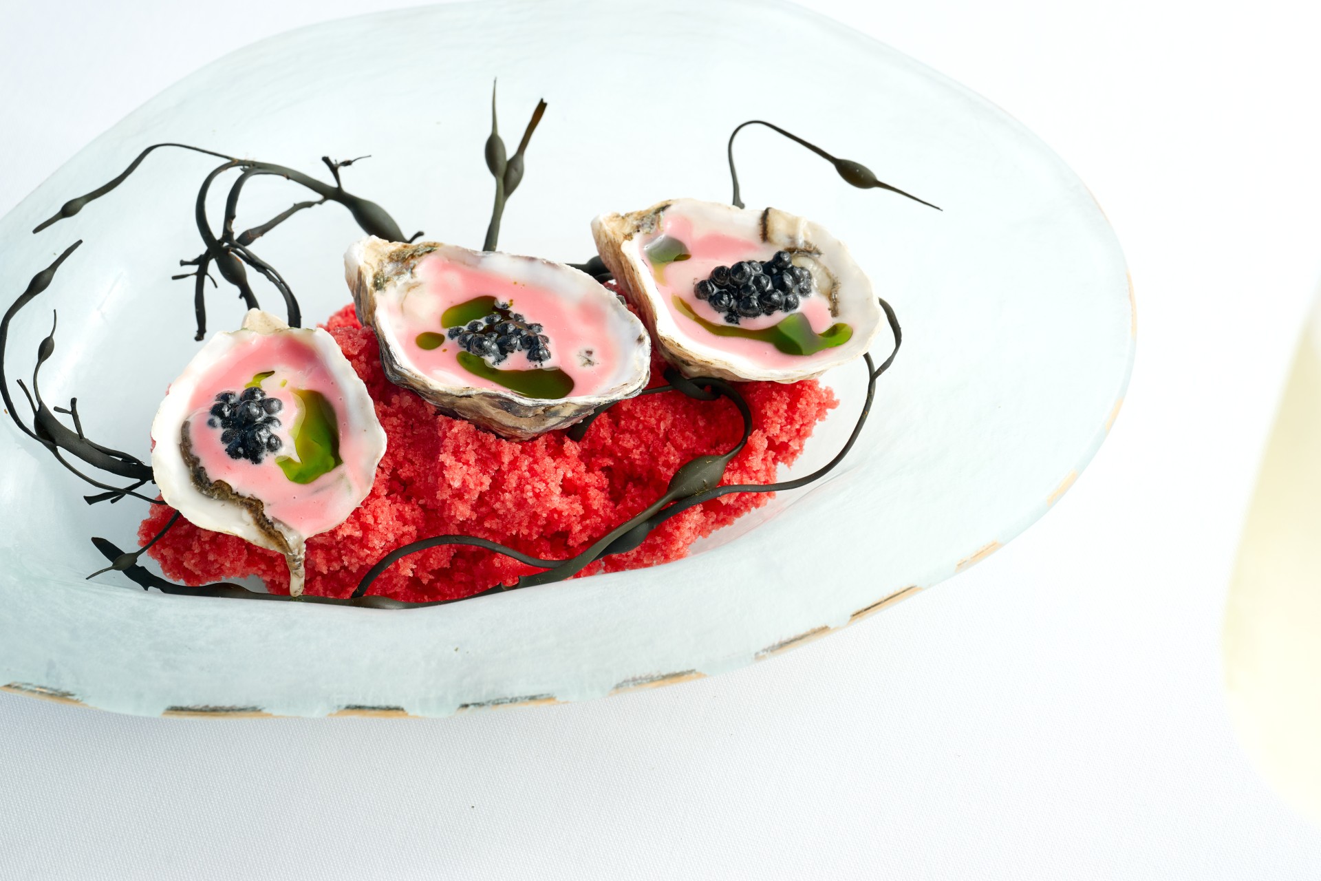 a plate of food on a white surface