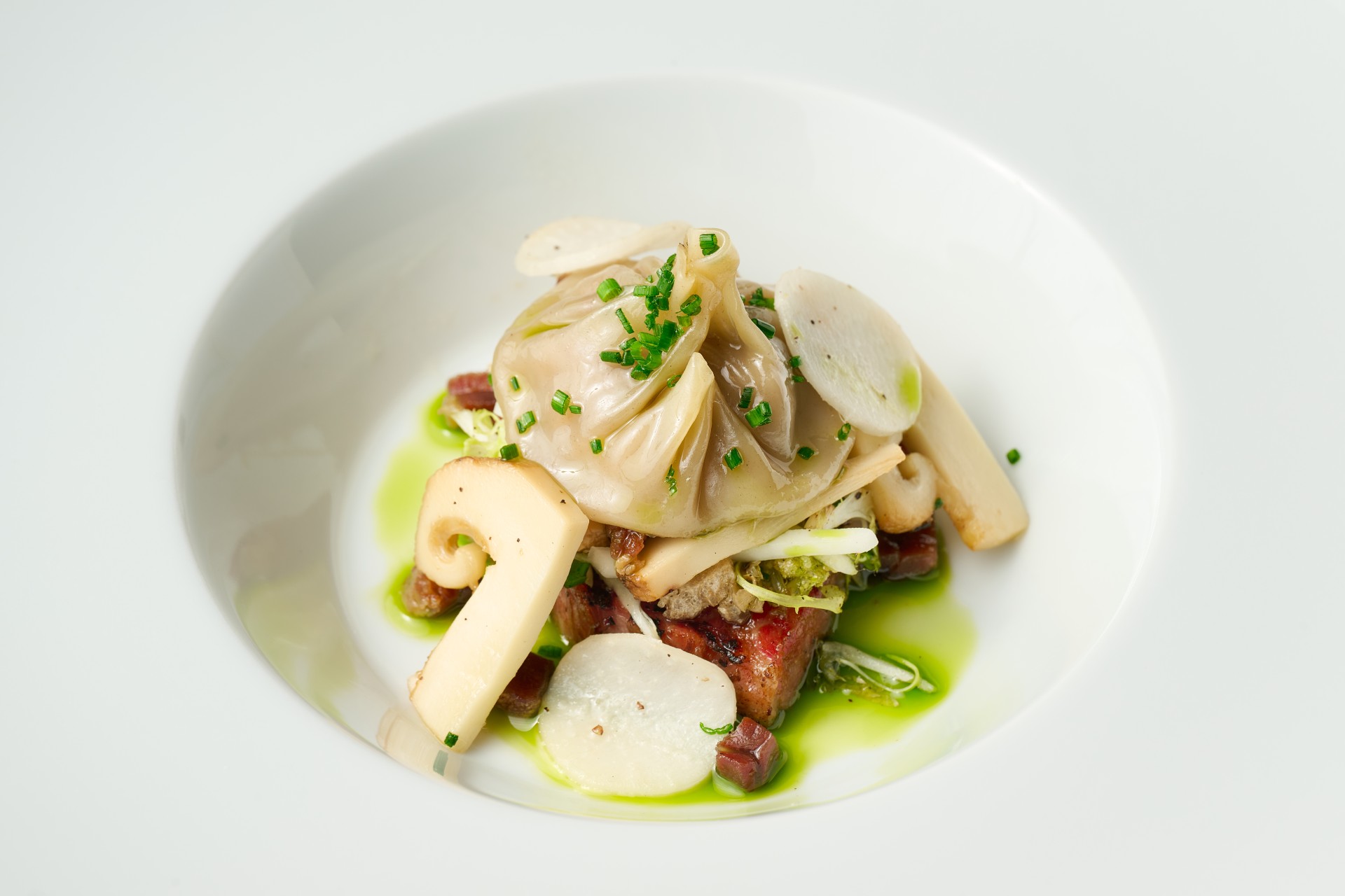 a plate of food on a white surface