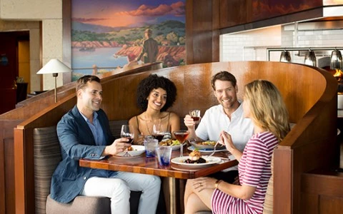 a group of people sitting at a table