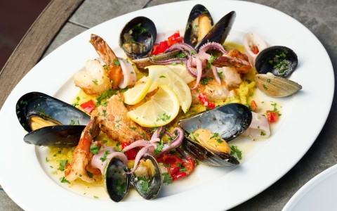 a plate of seafood on a table