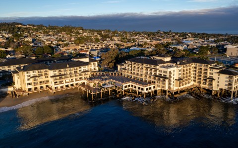 a large building next to a body of water