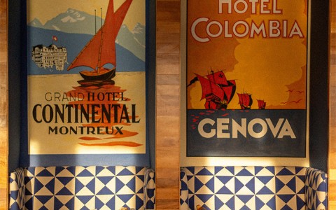 a two tables and chairs in a restaurant