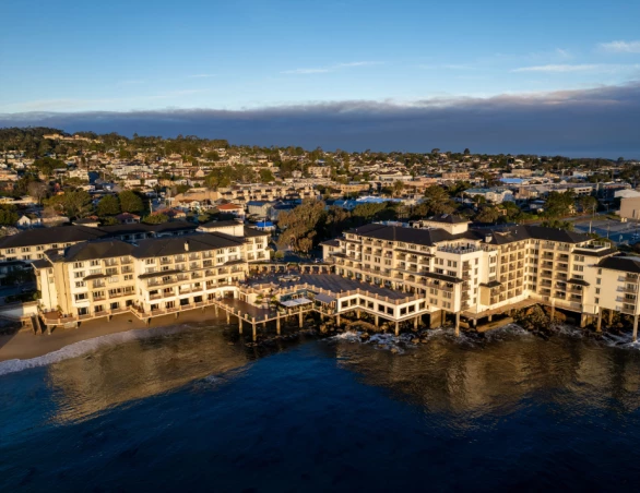 a large building next to a body of water