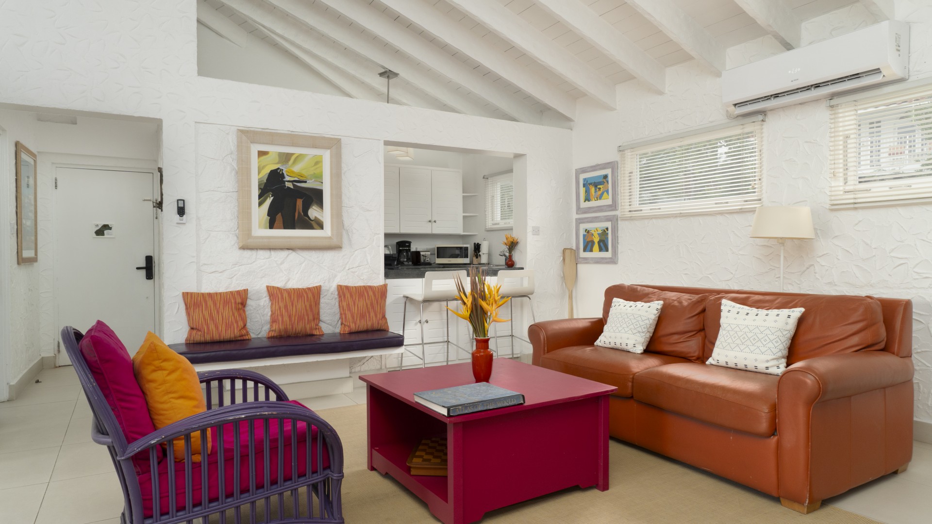 a living room with couches and a table