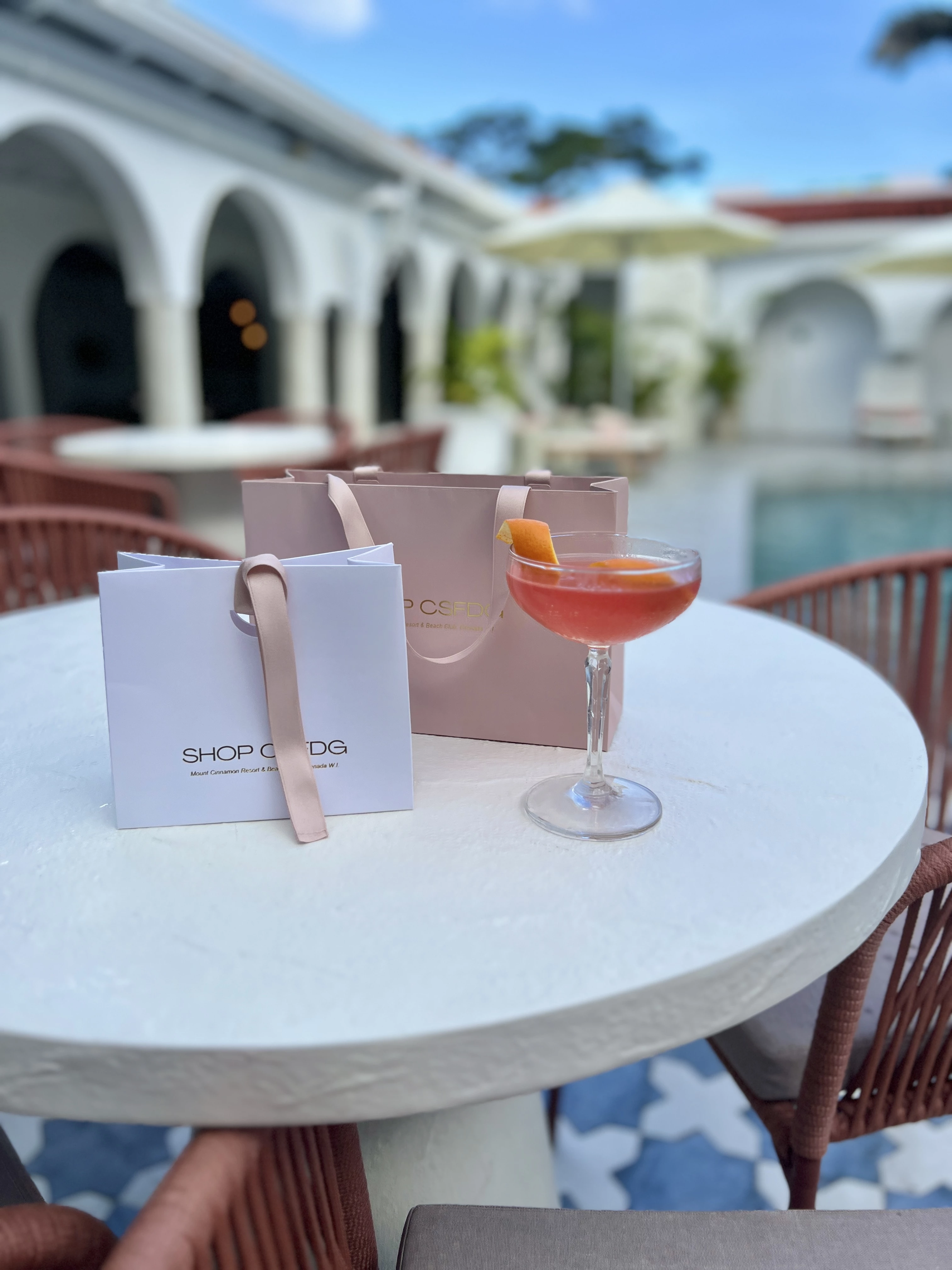 a drink and bag on a table