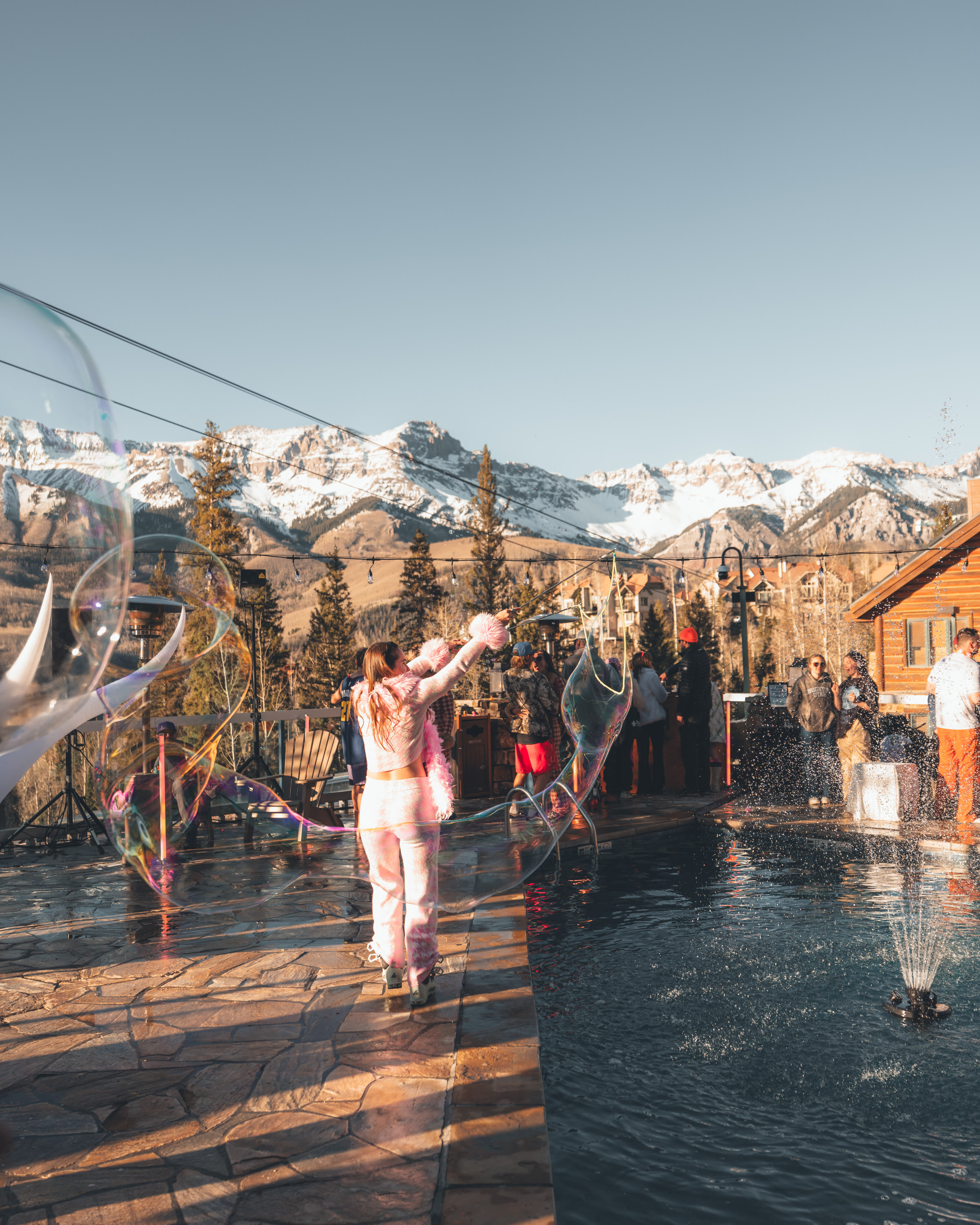 Après at 9,545 on the pool deck, mountains behind