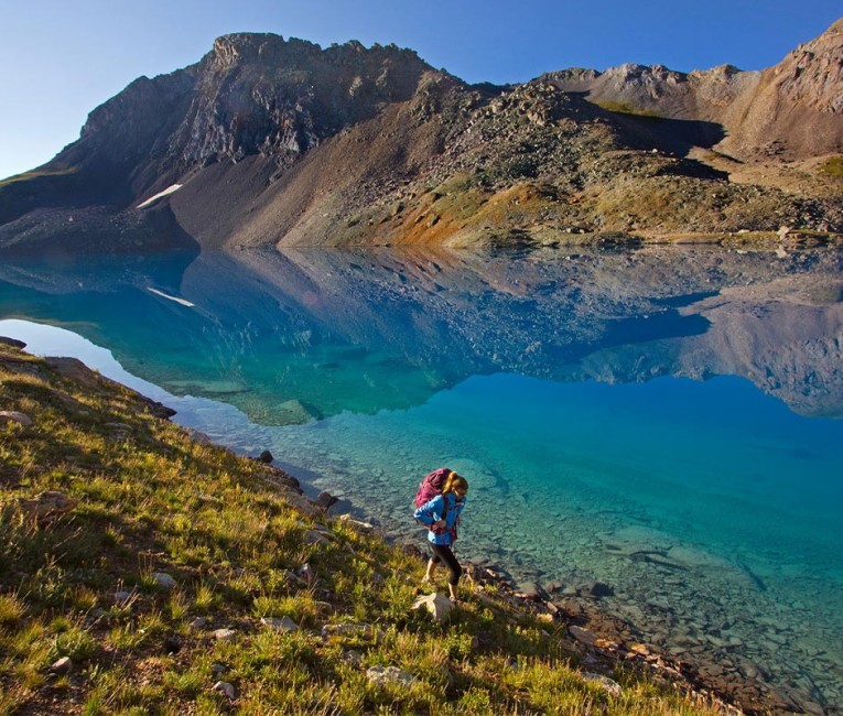 a person hiking on a mountain