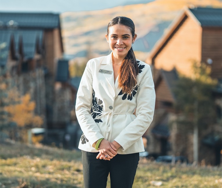 a woman smiling at camera