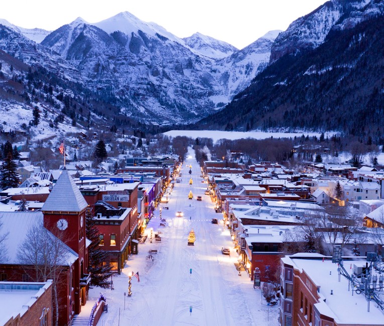 a town with snow and mountains