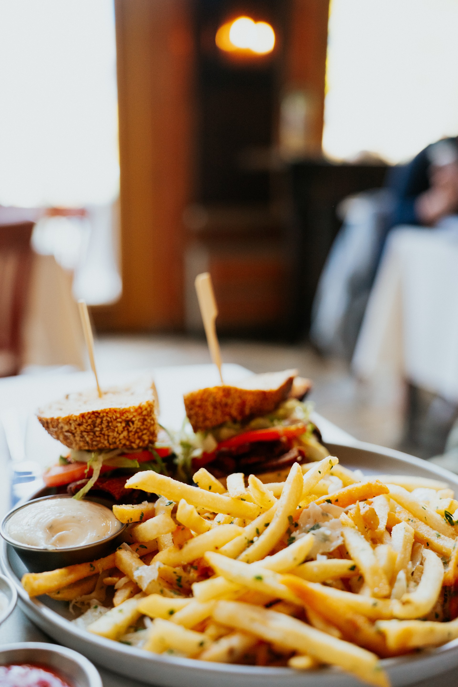 a plate of food with a sandwich and fries