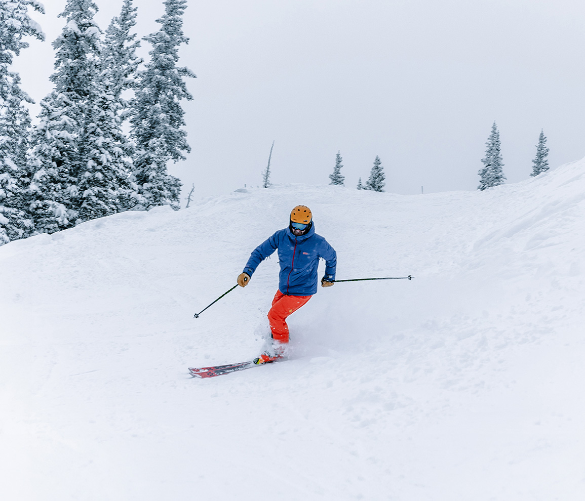 a person skiing down a slope