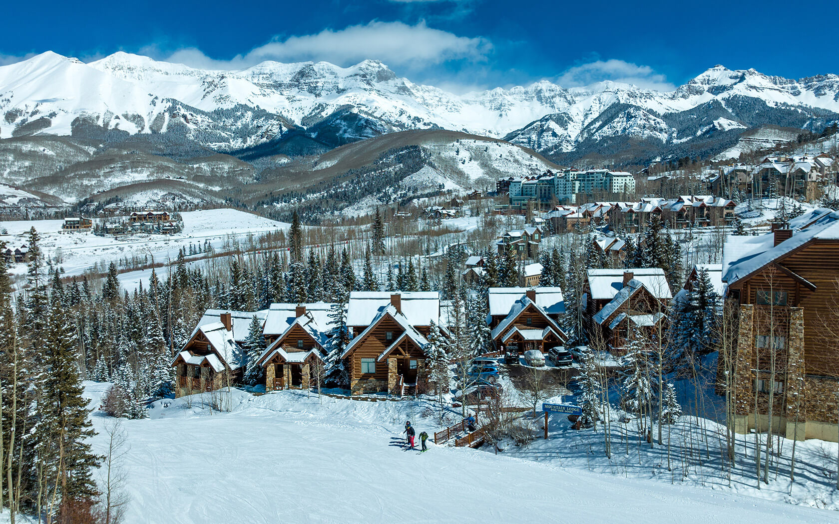 Mountain Lodge Telluride cabins and the San Juans after a snowfall