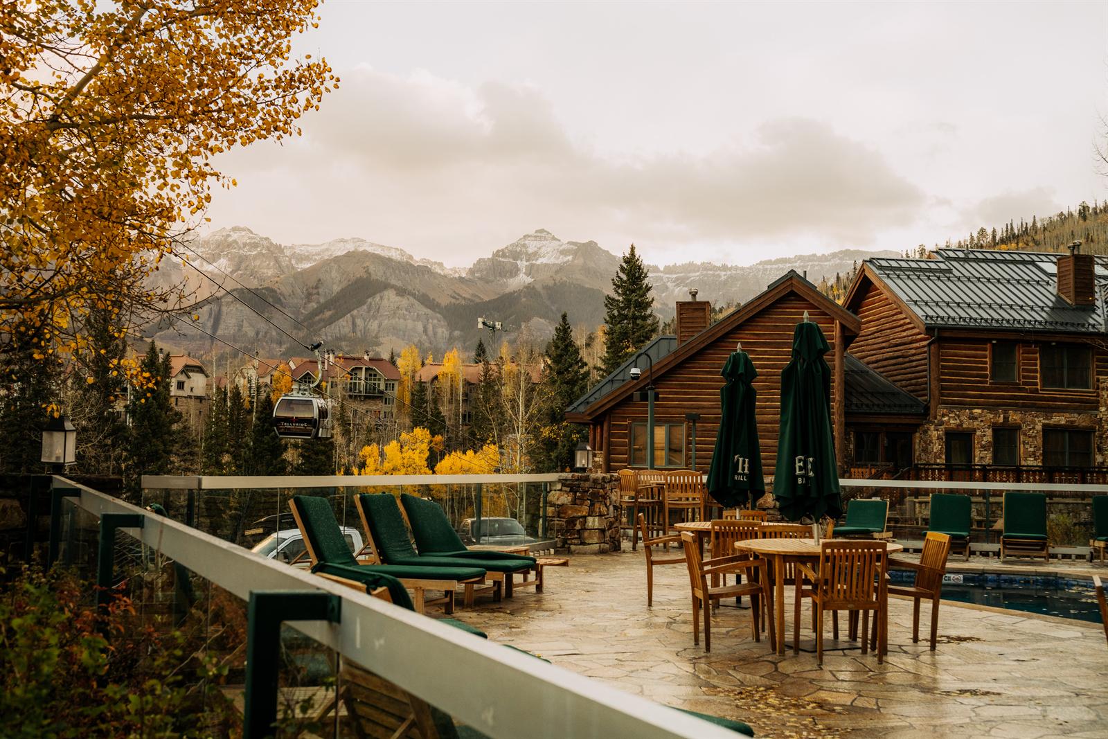 Pool deck and patio at Mountain Lodge Telluride facing the peaks