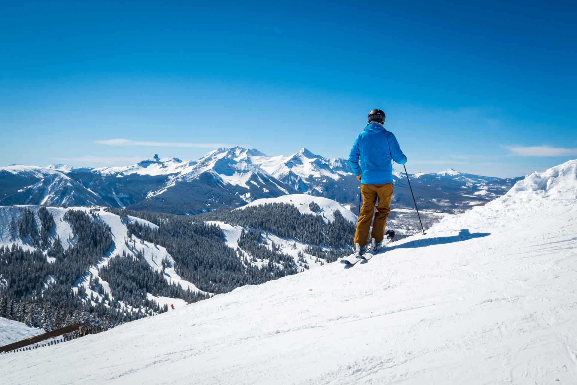 a person skiing on a snowy mountain