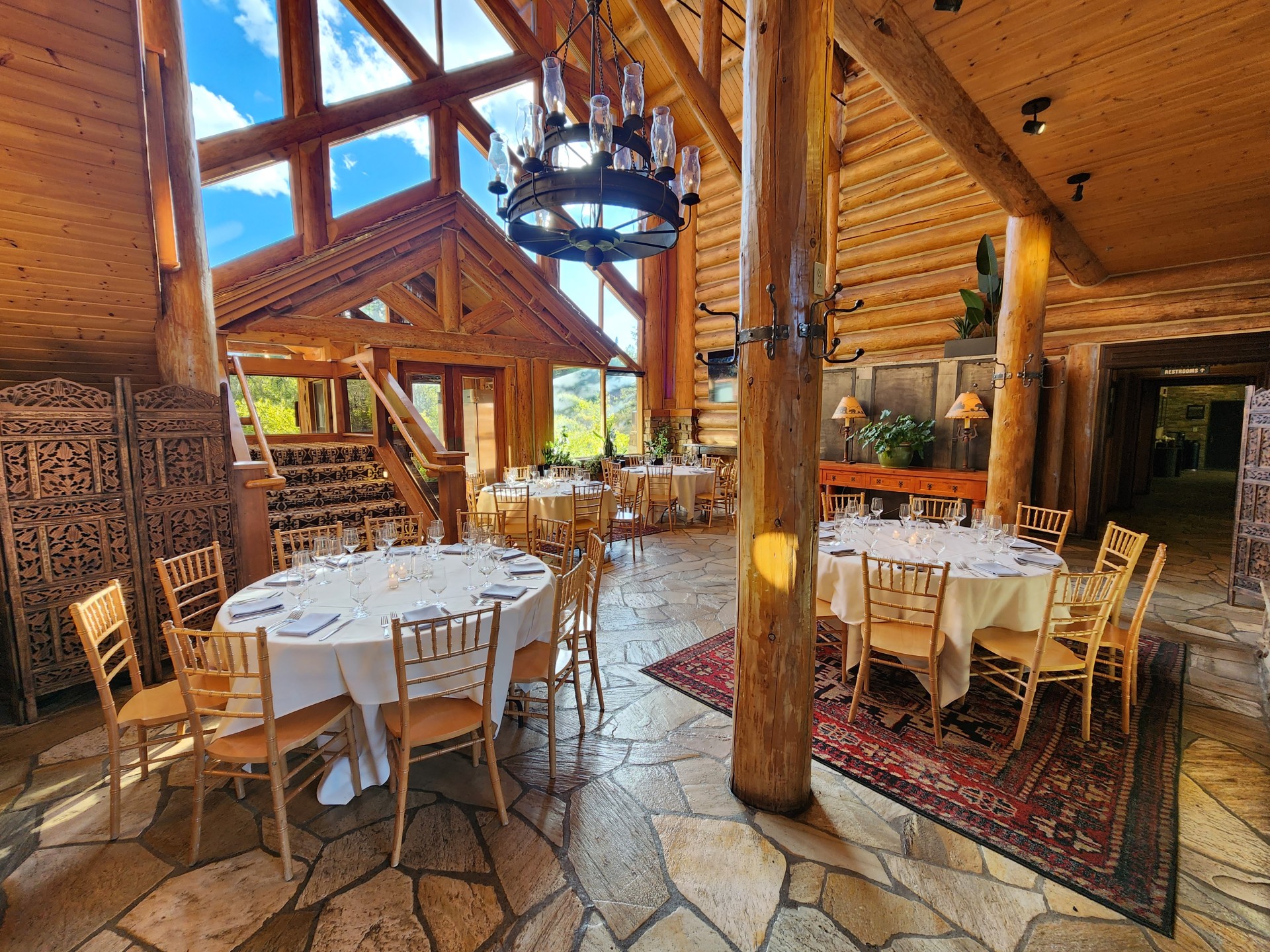 a room with tables and chairs