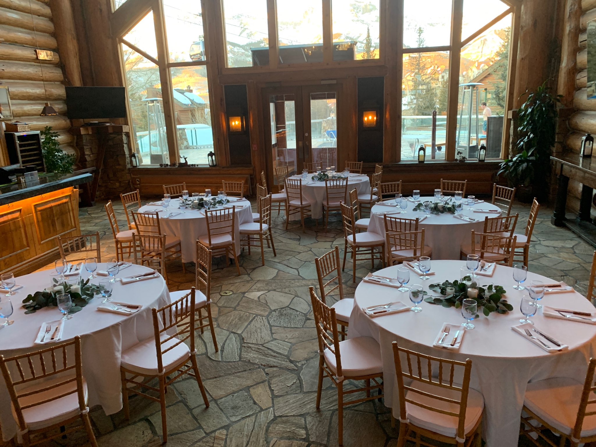 a room with tables and chairs