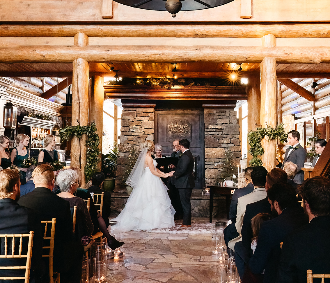 a bride and groom dancing at a wedding reception