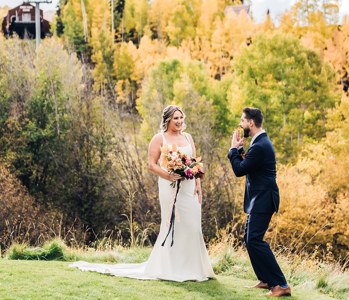 a man and woman in wedding attire