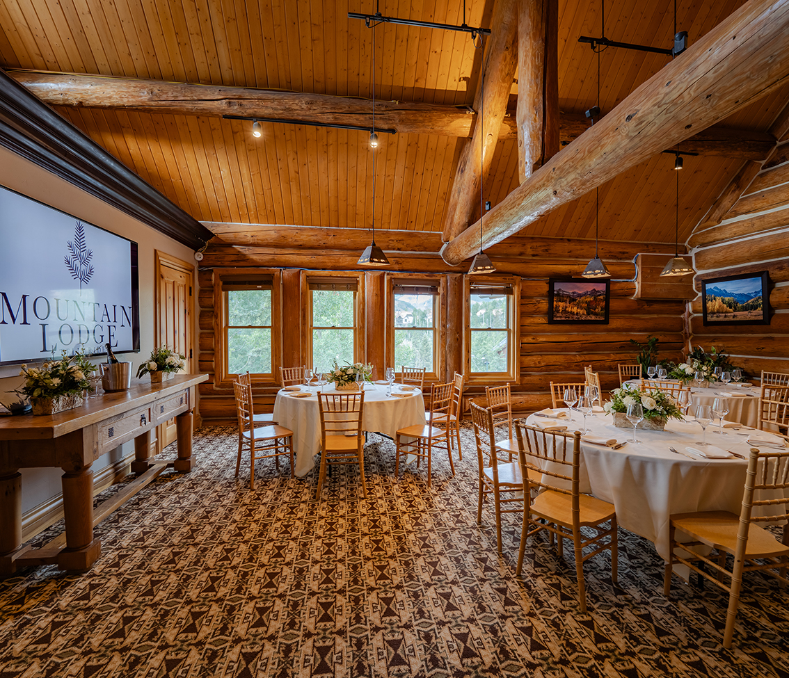 a room with tables and chairs
