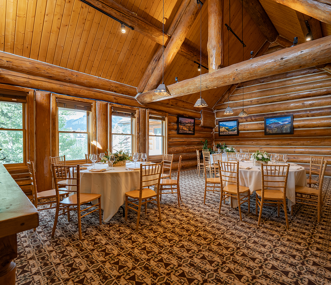 a room with tables and chairs