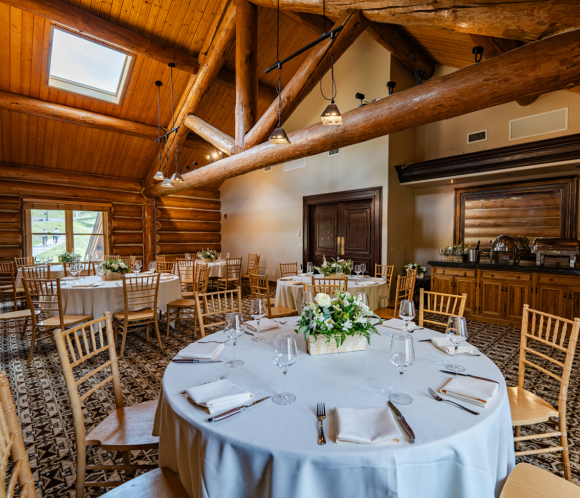 a large room with tables and chairs