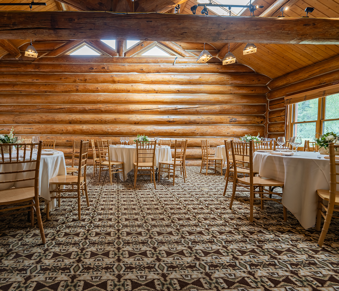 a room with tables and chairs