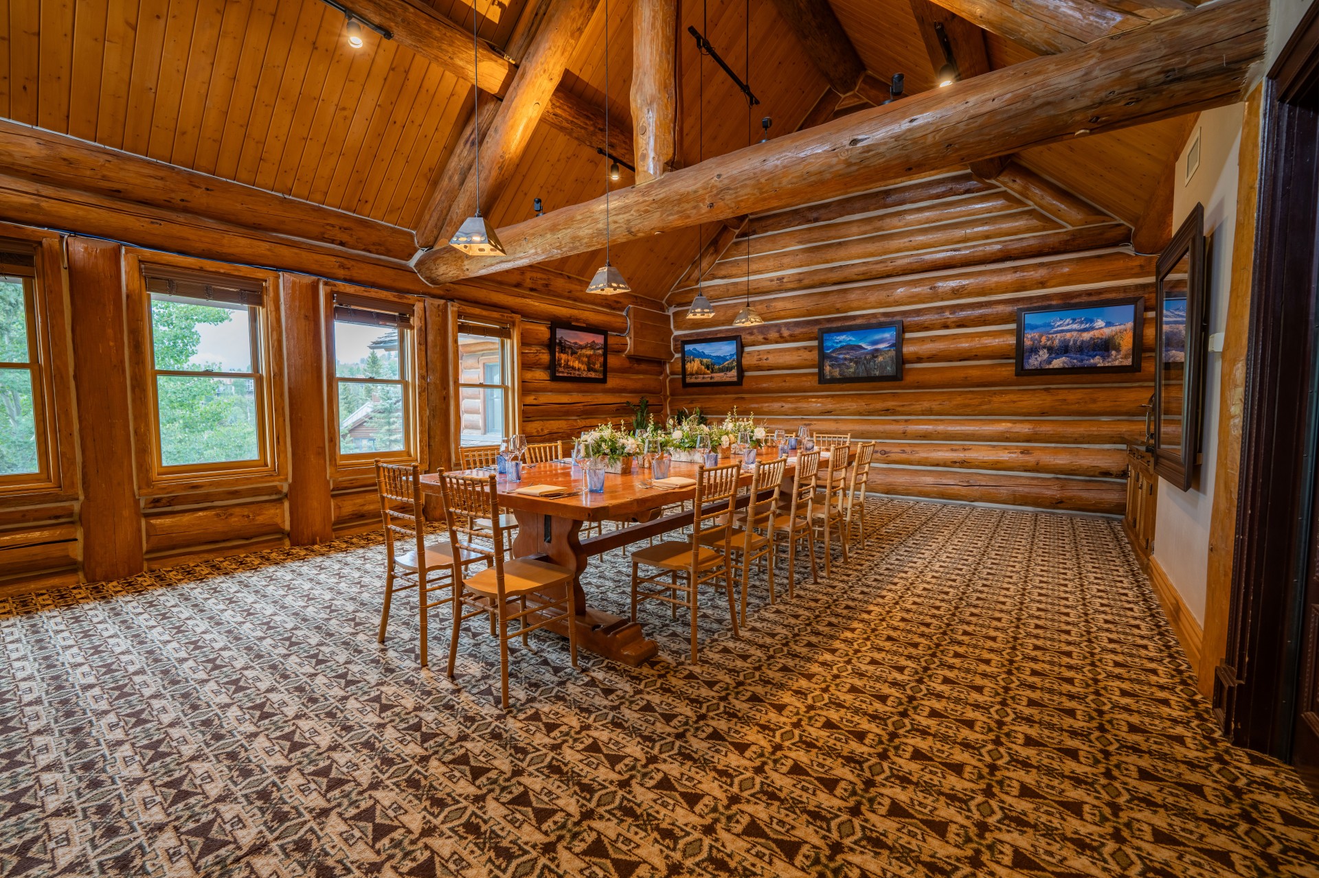 a room with a table and chairs