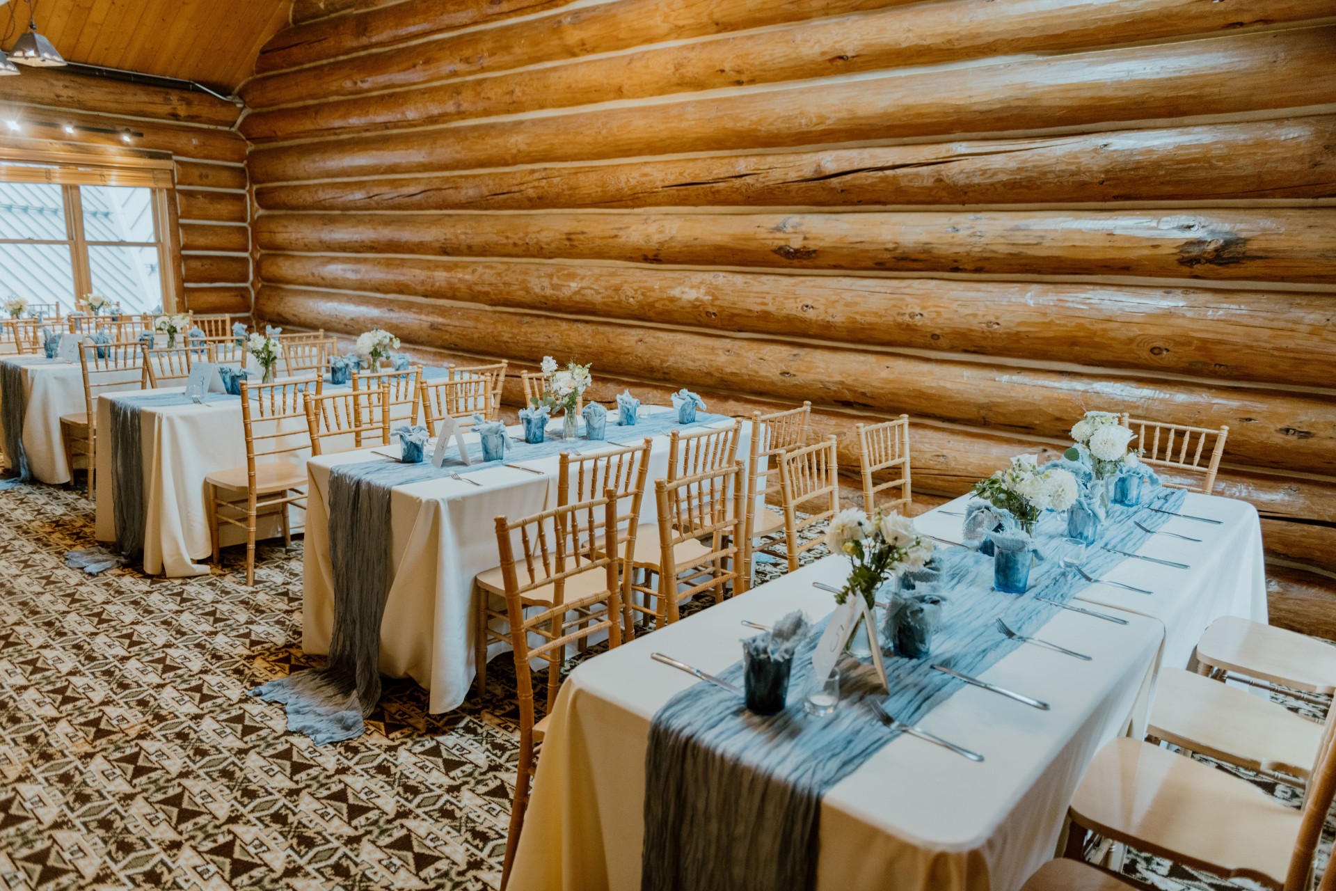 a room with tables and chairs
