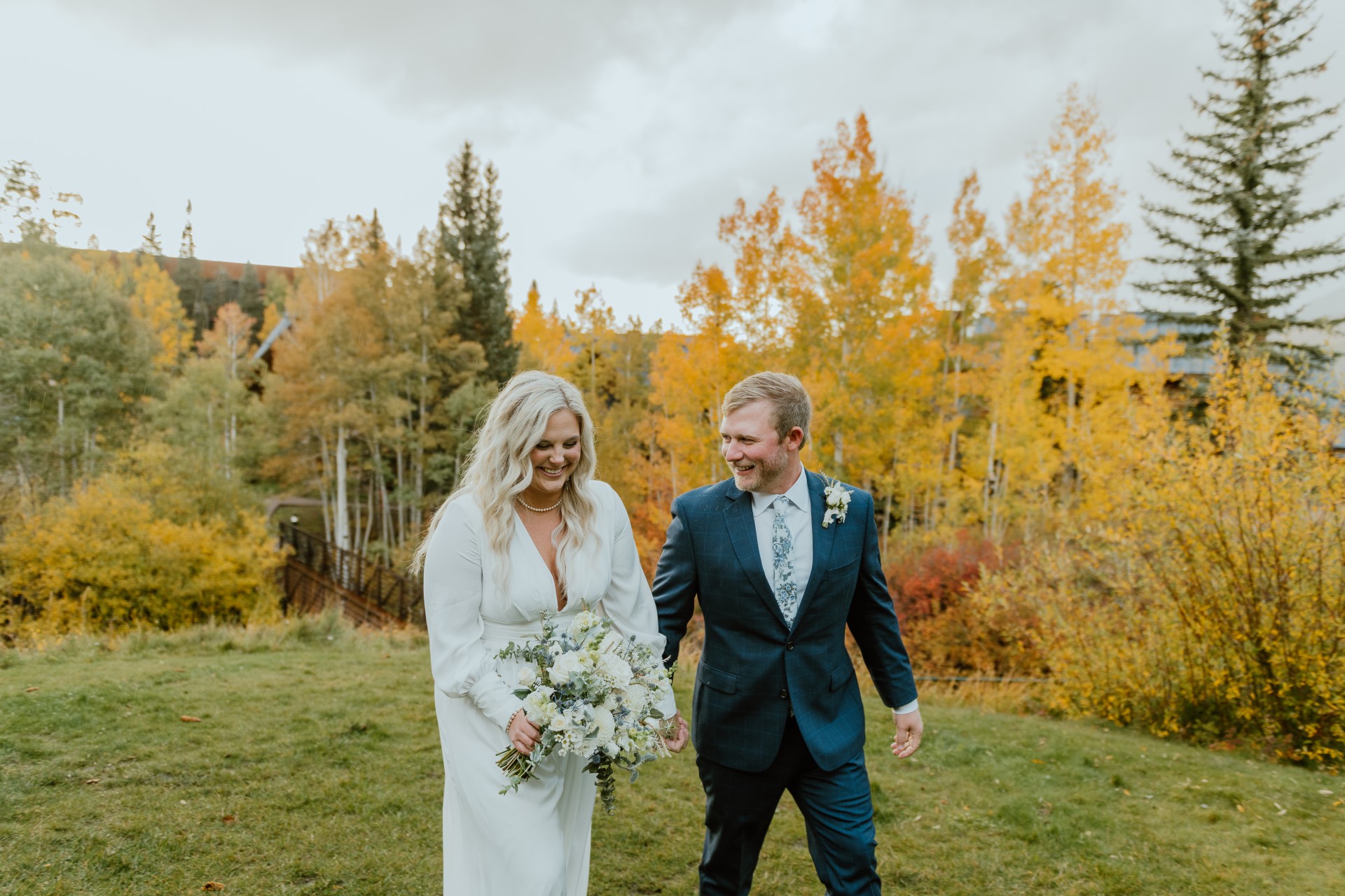 a man and woman in a white dress