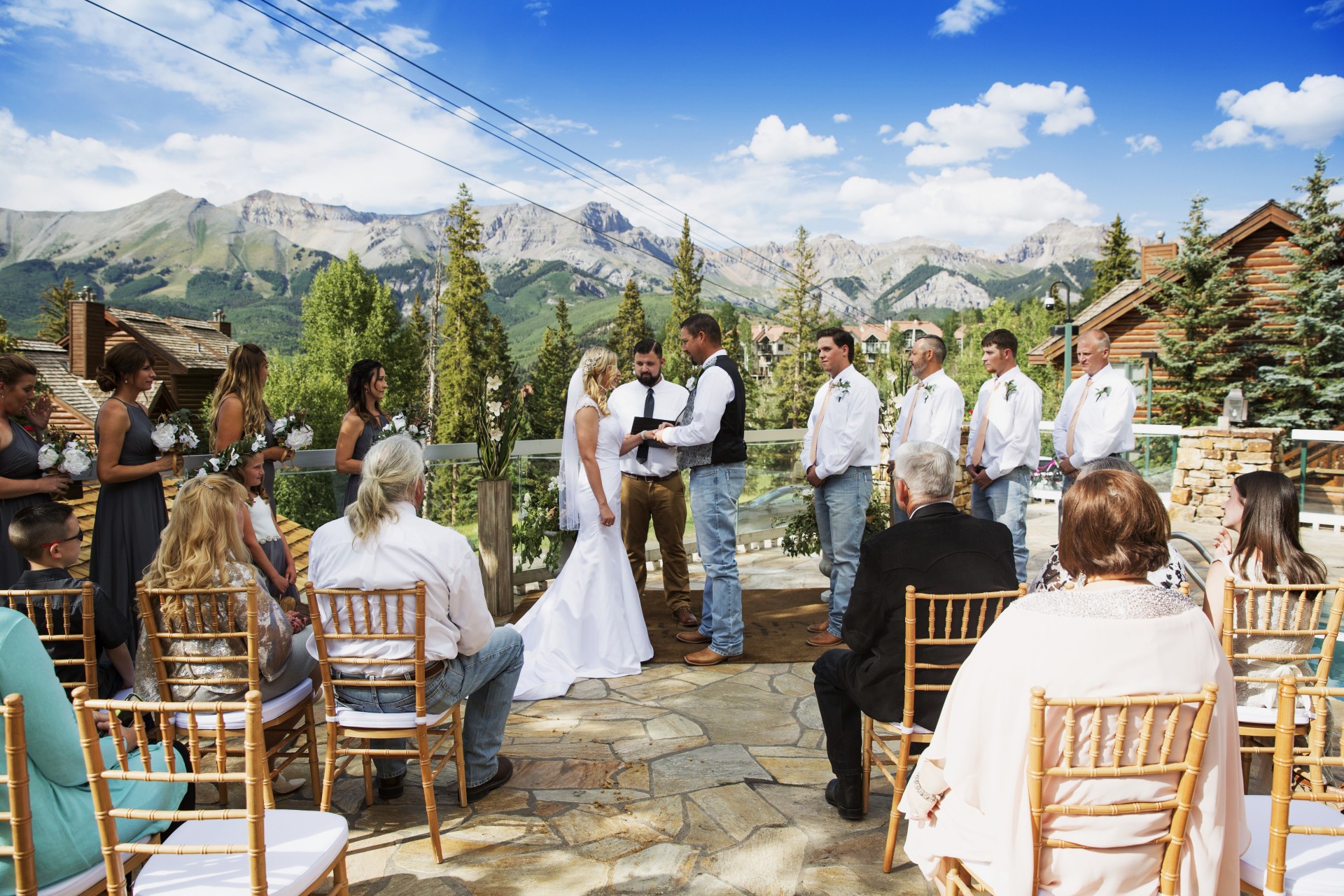 a group of people standing around each other