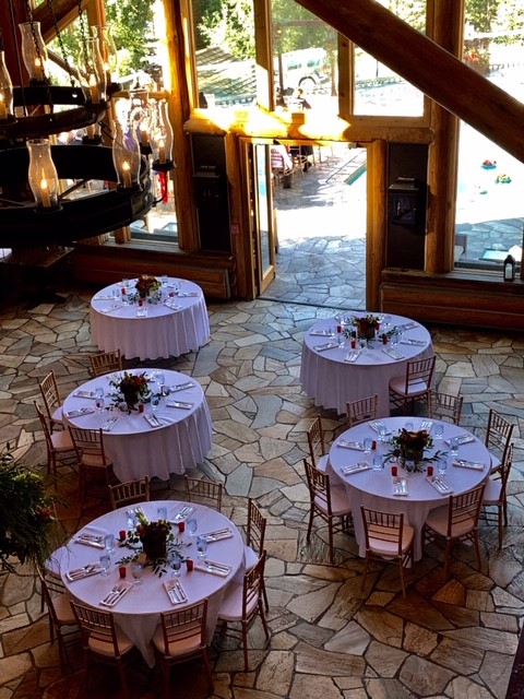 a group of tables set up in a room