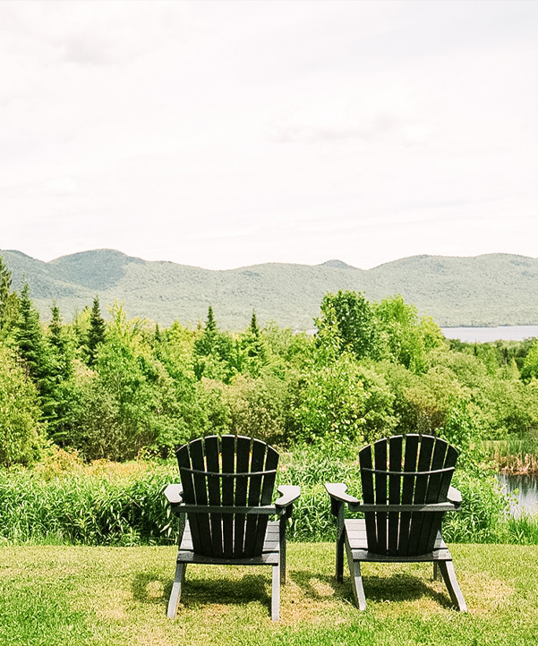 two chairs on a grassy field