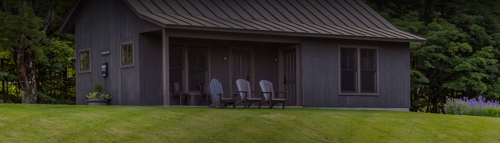 a lawn chairs outside a building